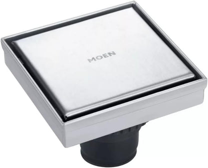 Moen - Coladera P/Piso Moen 207321 Cuad. (Ins. Ceram.)